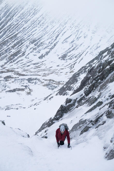 Soloing up the initial ice to the first belay ledge