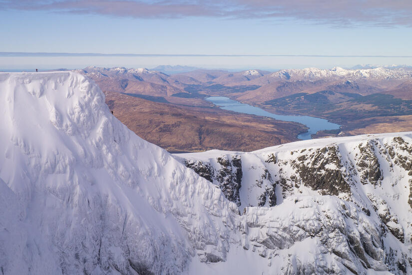 Climbers on Tower Ridge with the Cuillins in the background