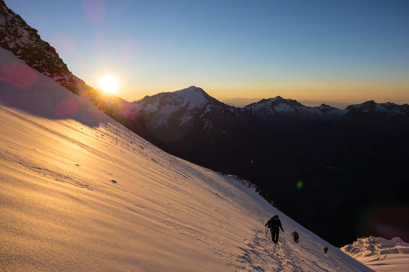 Sunrise approaching the Windjoch while climbing the Nadelhorn