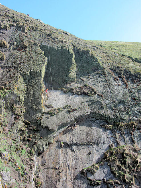 Sarah below the overlap on American Beauty, Lundy (© D Linnett)